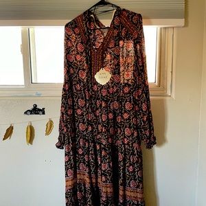 From Target ankle length, long sleeve maxi dress. Tie strings around neck